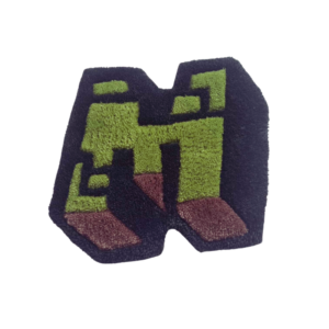 Décoration murale en tufting representant le logo de Minecraft